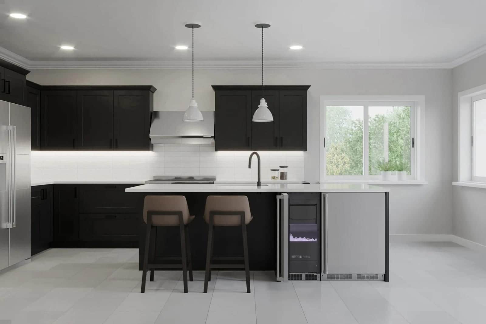 A Marvel beverage center built into a dark kitchen island