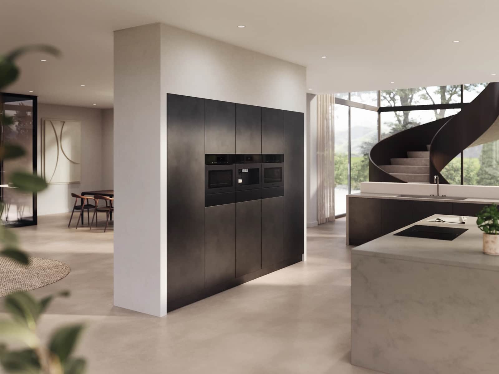A black Miele built-in oven, coffee system, and speed oven set into a dark column in a minimal open-plan kitchen with a spiral staircase